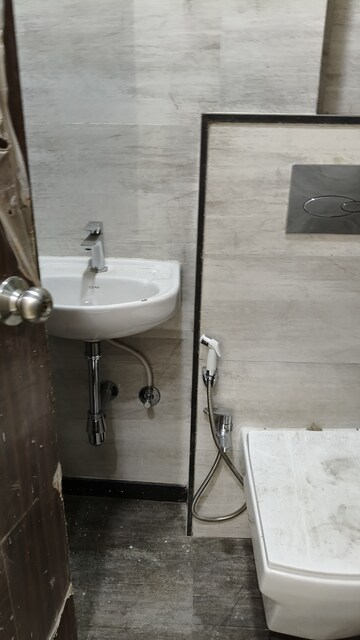 Bathroom in 2 BHK Apartment at Gundecha Symphony, Andheri West – for Sale
