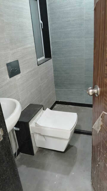 Bathroom in 2 BHK Apartment at Gundecha Symphony, Andheri West – for Sale