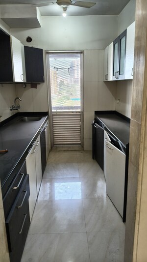 Kitchen in 2 BHK Apartment at Gundecha Symphony, Andheri West – for Sale