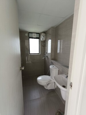 Bathroom in 3 BHK Apartment at Runwal Gardens, Dombivli East – for Rent