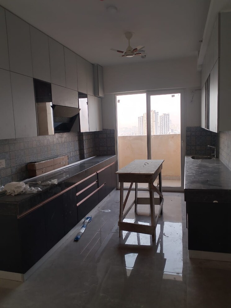 Kitchen, tulip-yellow 3 Bedroom 1704 Sq.Ft. Apartment In Sector 69 Gurgaon 9301497