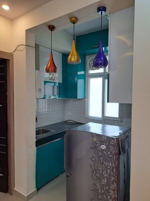 Kitchen in 1 BHK Apartment at Shree Vardhman Green Court, Sector 90 – for Rent