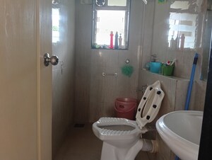 Bathroom in 2 BHK Apartment at Kalpataru Shravasti, Malad West – for Rent