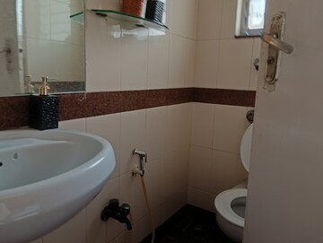 Bathroom in 2 BHK Apartment at Kalpataru Shravasti, Malad West – for Rent
