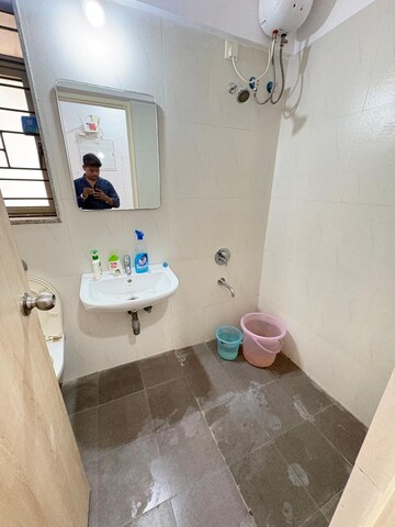 Bathroom in 2 BHK Apartment at Lodha Nautica, Dombivli East – for Rent