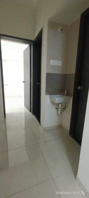 Bathroom in 2 BHK Apartment at Paranjape Schemes Richmond Park, Rahatani – for Rent