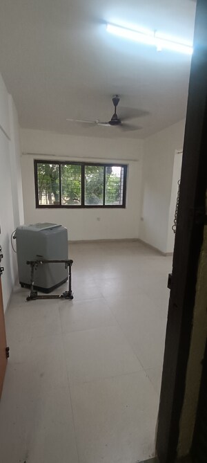 Room in 2 BHK Apartment at Mangalam CHS Kandivali East, Kandivali East – for Rent