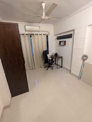 Bedroom in 2 BHK Apartment at Manish Garden CHS, Andheri West – for Rent