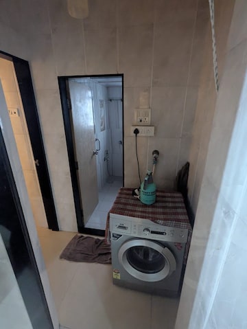Bathroom in 2 BHK Apartment at Manish Garden CHS, Andheri West – for Rent