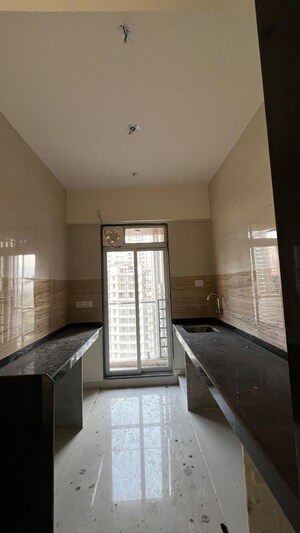 Kitchen in 2 BHK Apartment at Green Acres Apartment, Waghbil – for Rent