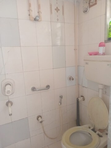 Bathroom in 2 BHK Apartment at Manish Sun Flower Apartment, Andheri West – for Rent