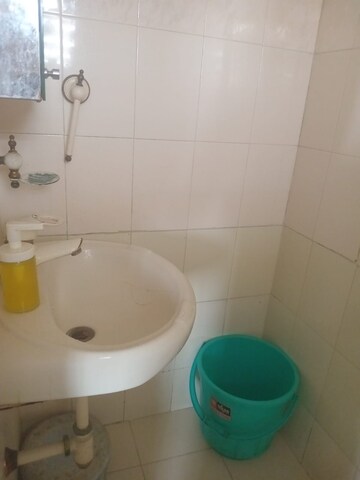 Bathroom in 2 BHK Apartment at Manish Sun Flower Apartment, Andheri West – for Rent