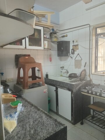 Kitchen in 2 BHK Apartment at Manish Sun Flower Apartment, Andheri West – for Rent