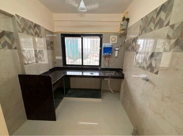Kitchen in 1 BHK Apartment at Ami Zarna, Malad West – for Sale