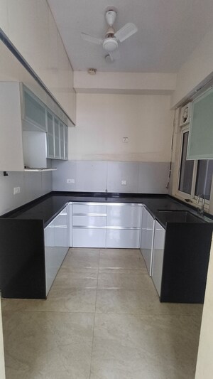 Kitchen in 2 BHK Apartment at Courtyard by Narang Realty and The Wadhwa Group, Pokhran Road No Two – for Rent