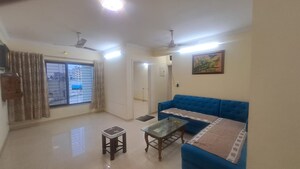 Living Room in 2 BHK Apartment at Arjun CHS Vasant Vihar, Vasant Vihar – for Rent