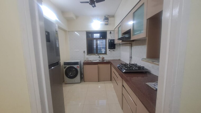Kitchen, arjun-chs-vasant-vihar 2 Bedroom 950 Sq.Ft. Apartment In Vasant Vihar Thane 9301788