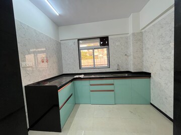 Kitchen in 2 BHK Apartment at Tembhi Naka – for Rent