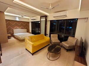 Living Room in 2 BHK Apartment at Gundecha Greens, Kandivali East – for Sale
