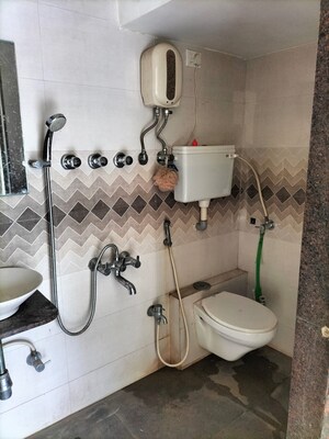 Bathroom in 2 BHK Apartment at Poonam Park View, Virar West – for Sale