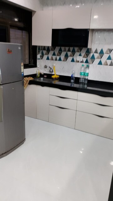Kitchen in 2 BHK Apartment at Raghav Nova, Kurla East – for Rent