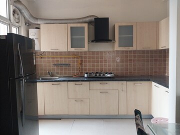 Kitchen in 3 BHK Apartment at Mahagun Mywoods, Sector 16c Greater Noida – for Rent