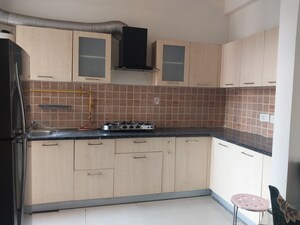 Kitchen in 3 BHK Apartment at Mahagun Mywoods, Sector 16c Greater Noida – for Rent