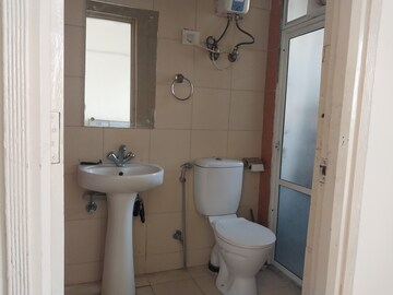 Bathroom in 3 BHK Apartment at Mahagun Mywoods, Sector 16c Greater Noida – for Rent