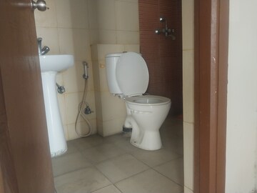 Bathroom in 2 BHK Apartment at Mahagun Mywoods, Sector 16c Greater Noida – for Rent