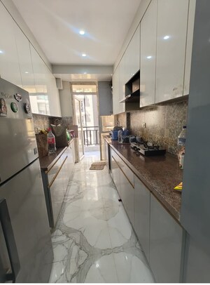 Kitchen in 3 BHK Apartment at Aims Greens Avenue, Sector 4 Greater Noida – for Rent