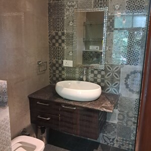 Bathroom in 3 BHK Builder Floor at Gulmohar Park – for Rent
