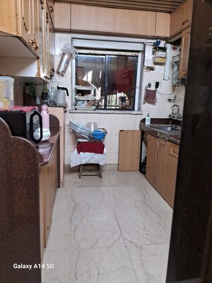 Kitchen in 3 BHK Apartment at Shiv Shivam Apartment, Andheri West – for Sale