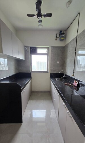 Kitchen in 2 BHK Apartment at Sheth Irene, Malad West – for Sale