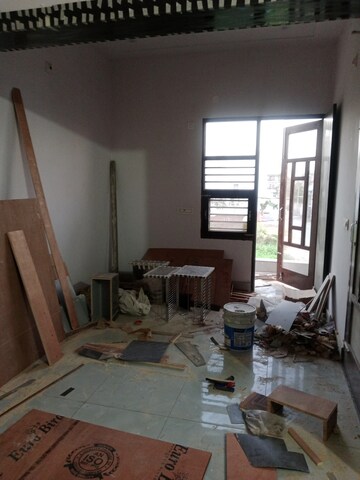 Living Room in 1.5 BHK Builder Floor at Sector 18 – for Rent