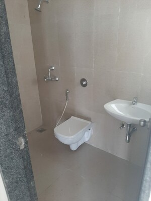 Bathroom in 3 BHK Apartment at Runwal Gardens, Dombivli East – for Rent