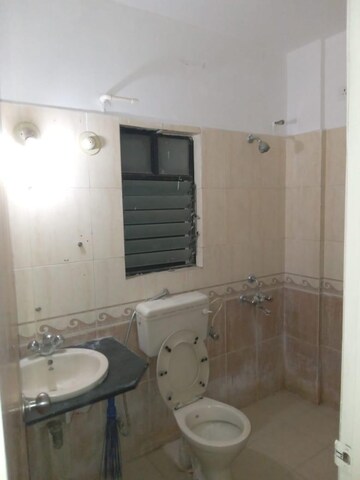 Bathroom in 2 BHK Apartment at Gulmohar Orchids, Kharadi – for Rent