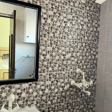 Bathroom in 3 BHK Apartment at Parsvnath Prestige, Sector 93a – for Rent