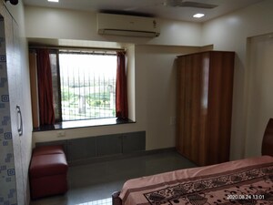 Living Room in 1 BHK Apartment at Ajmera Odyessey Apartment, Bhakti Park – for Rent