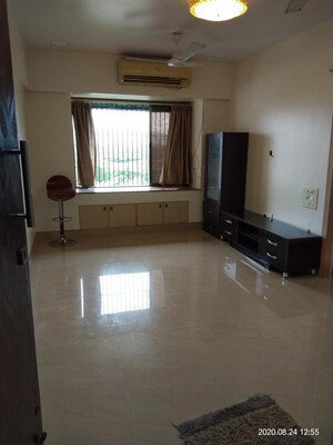 Living Room in 1 BHK Apartment at Ajmera Odyessey Apartment, Bhakti Park – for Rent