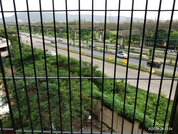 Balcony in 1 BHK Apartment at Ajmera Odyessey Apartment, Bhakti Park – for Rent