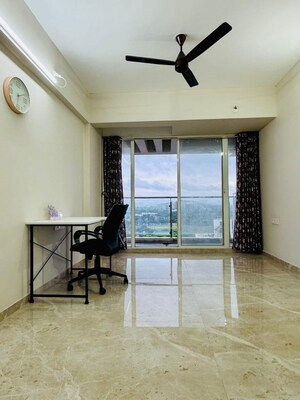 Living Room in 2 BHK Apartment at Gera Trinity Towers, Kharadi – for Rent