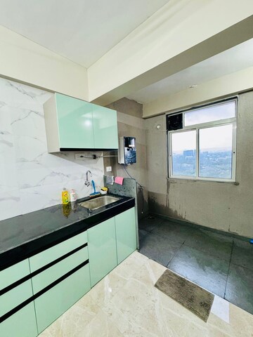 Kitchen in 2 BHK Apartment at Gera Trinity Towers, Kharadi – for Rent
