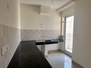 Kitchen in 2 BHK Apartment at Aditya City Apartments, Shahpur Bamheta – for Sale