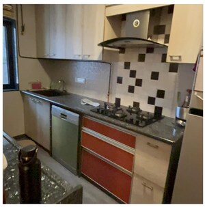 Kitchen in 2 BHK Apartment at Express Apartment, Yari Road – for Rent