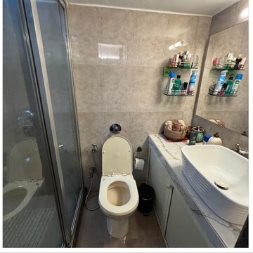 Bathroom in 2 BHK Apartment at Express Apartment, Yari Road – for Rent