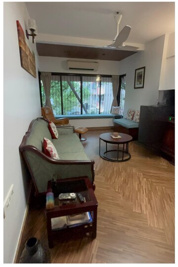 Living Room in 2 BHK Apartment at Express Apartment, Yari Road – for Rent