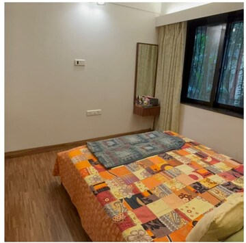 Bedroom in 2 BHK Apartment at Express Apartment, Yari Road – for Rent