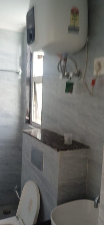 Bathroom in 4 BHK Apartment at Ram Shanti Apartment, Sector 52 – for Rent