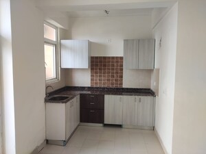 Kitchen in 3 BHK Apartment at Amrapali Crystal Homes, Sector 76 – for Rent