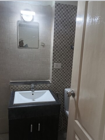 Bathroom in 2 BHK Apartment at Shri Radha Sky Park, Sector 16b Greater Noida – for Rent